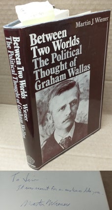 1228074 BETWEEN TWO WORLDS: THE POLITICAL THOUGHT OF GRAHAM WALLAS [Signed]. Martin J. Wiener