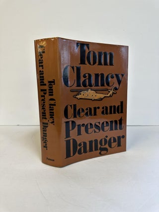 1374051 CLEAR AND PRESENT DANGER [Signed]. Tom Clancy