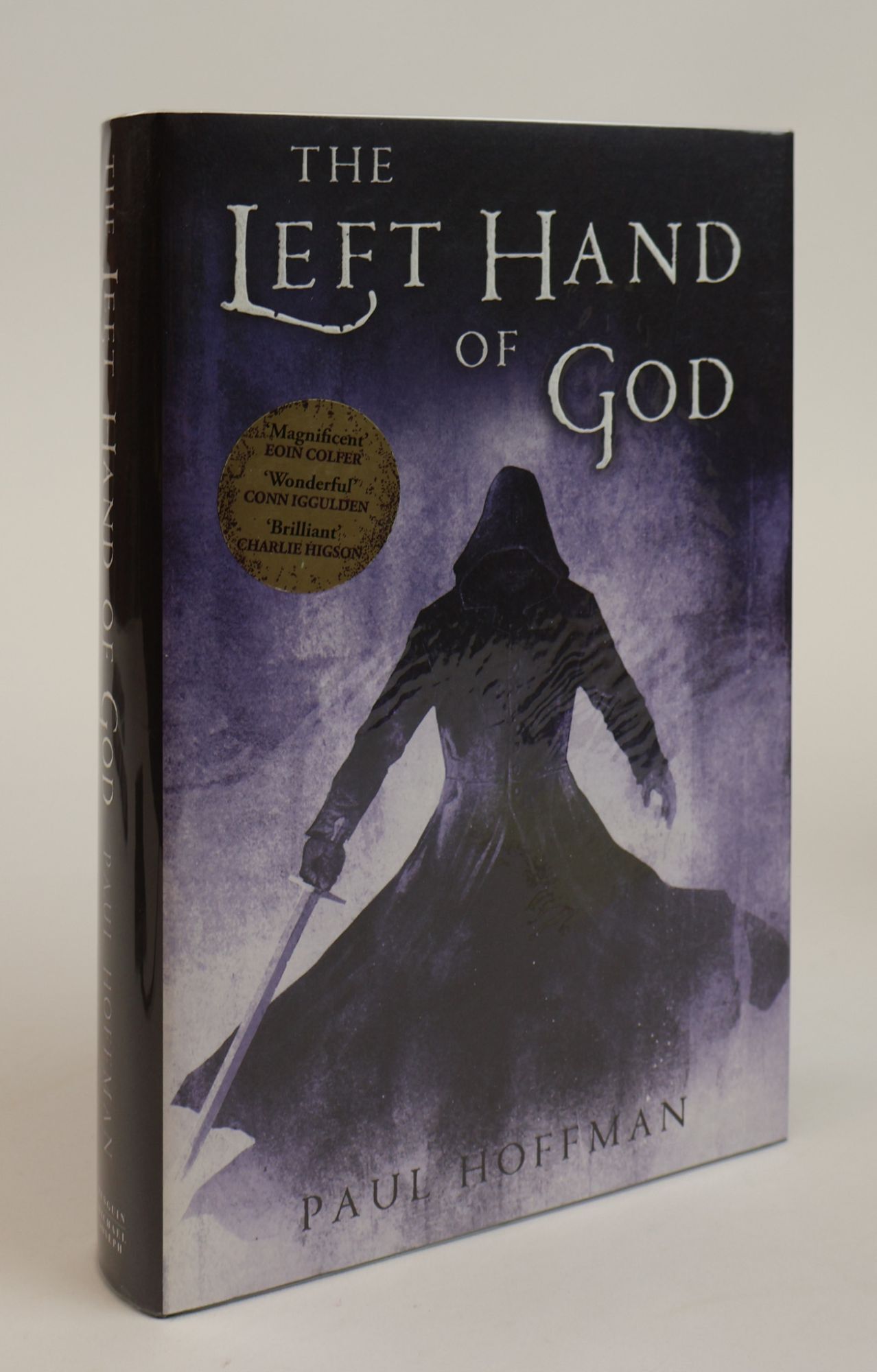 1383445 THE LEFT HAND OF GOD [Signed]. Paul Hoffman.