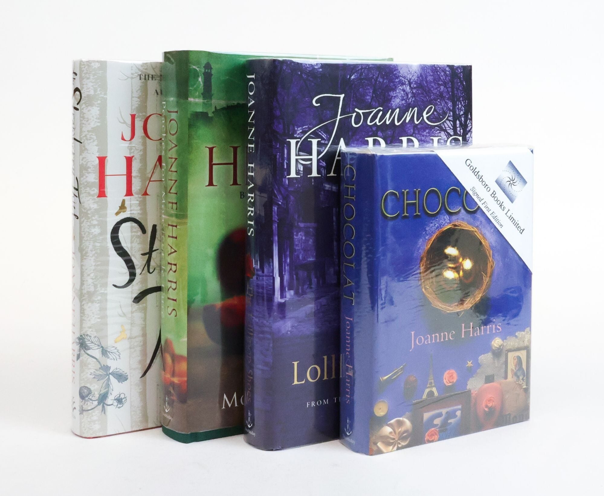 1385065 CHOCOLAT SERIES: CHOCOLAT [with] THE LOLLIPOP SHOES [and] PEACHES FOR MONSIEUR LE CURE [and] THE STRAWBERRY THIEF [Four Volumes] [All Signed]. Joanne Harris.