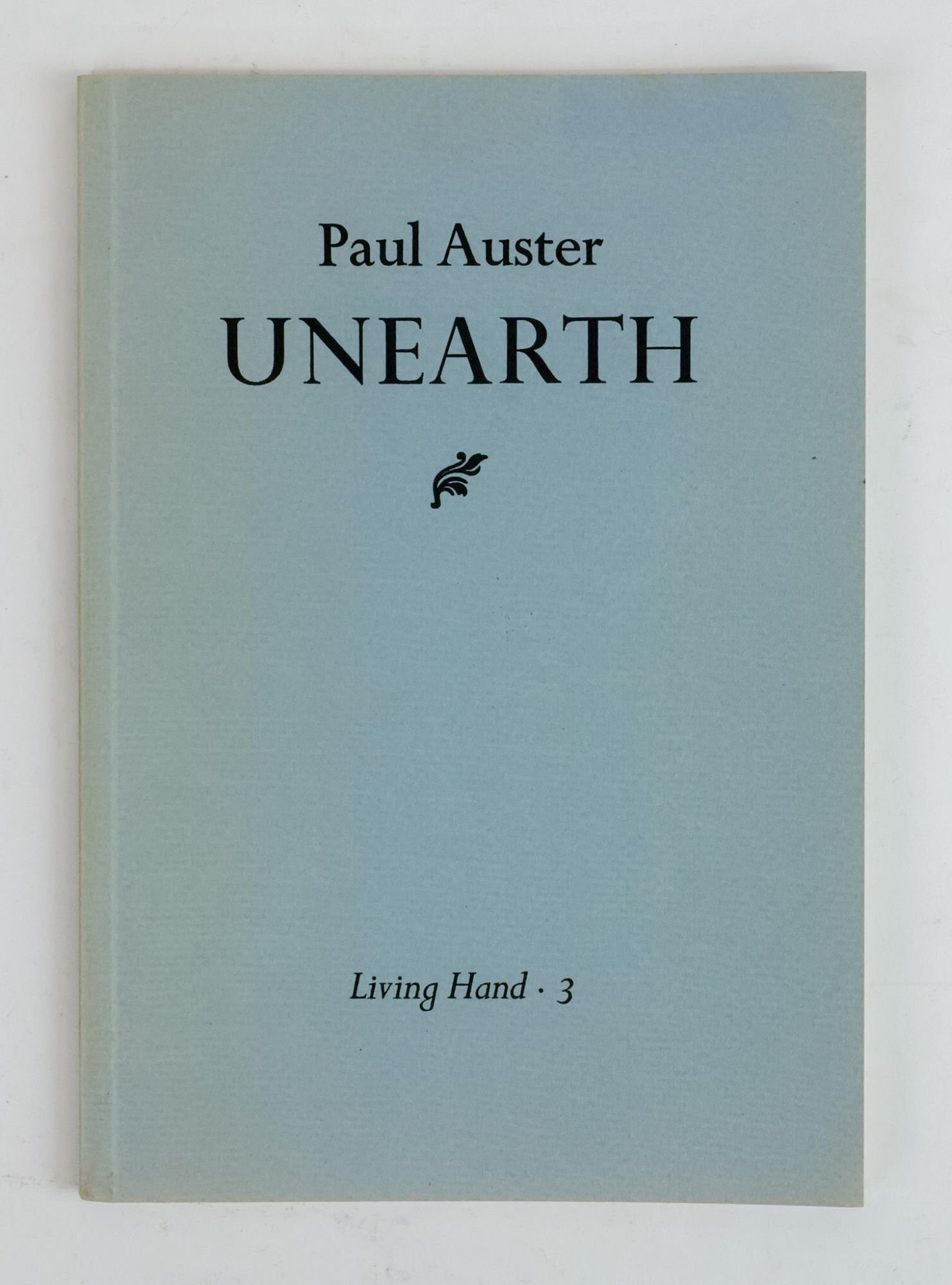 1386186 UNEARTH [Signed]. Paul Auster.