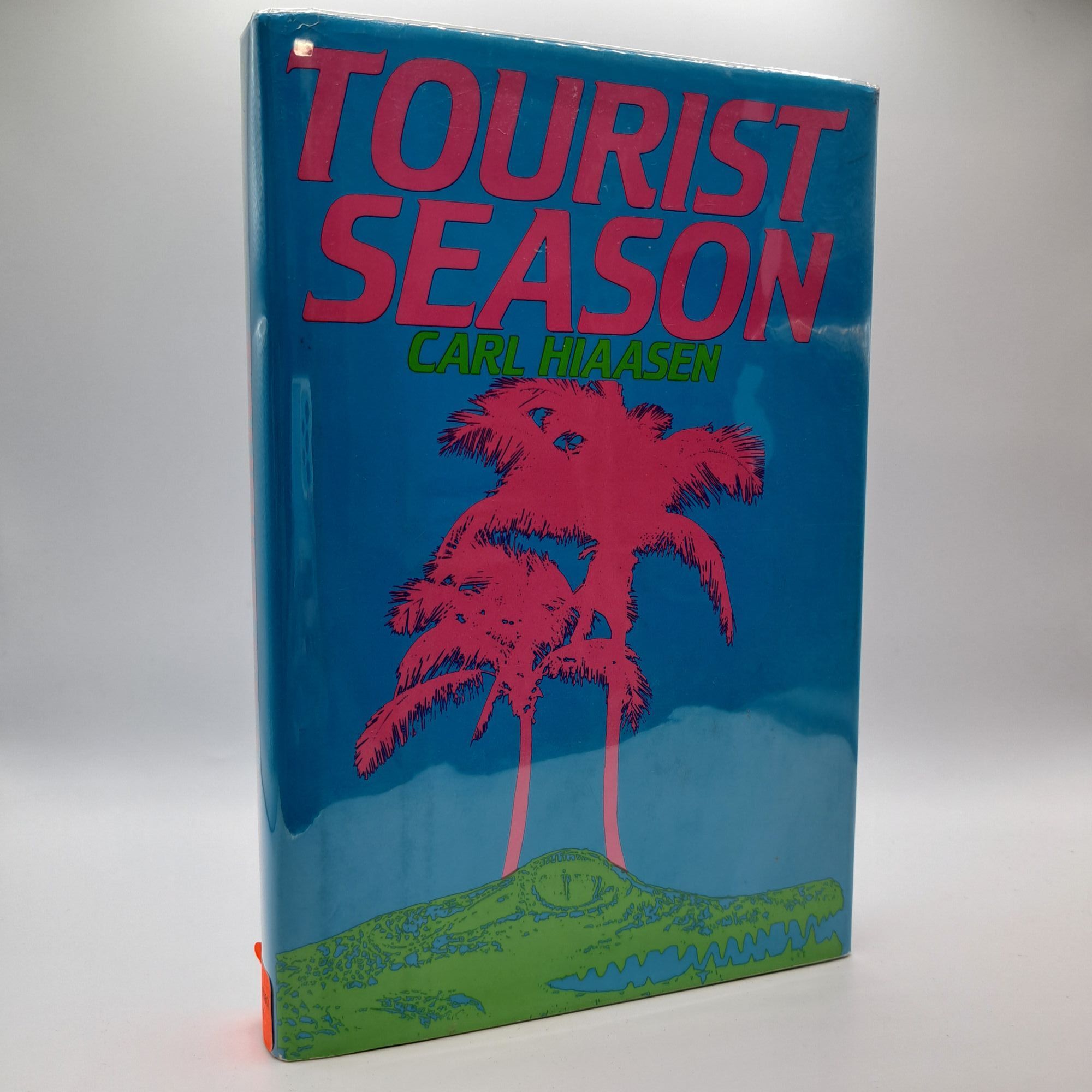 1387458 TOURIST SEASON [Signed]. Carl Hiaasen.
