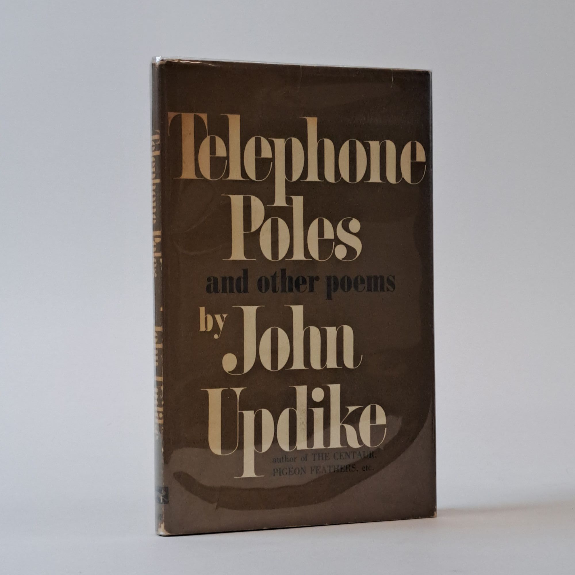 1394635 TELEPHONE POLES: AND OTHER POEMS [Signed]. John Updike.