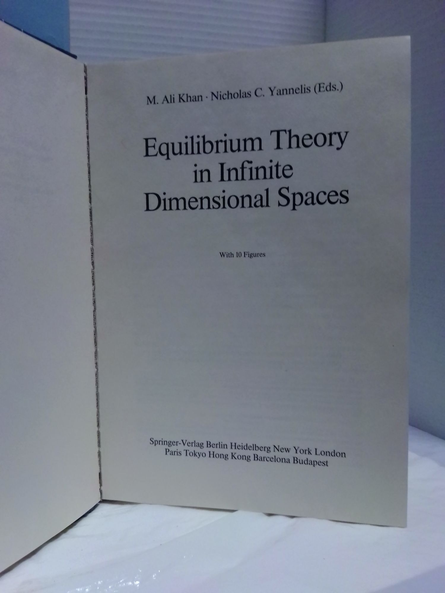 EQUILIBRIUM THEORY IN INFINITE DIMENSIONAL SPACES | M. Ali Khan ...