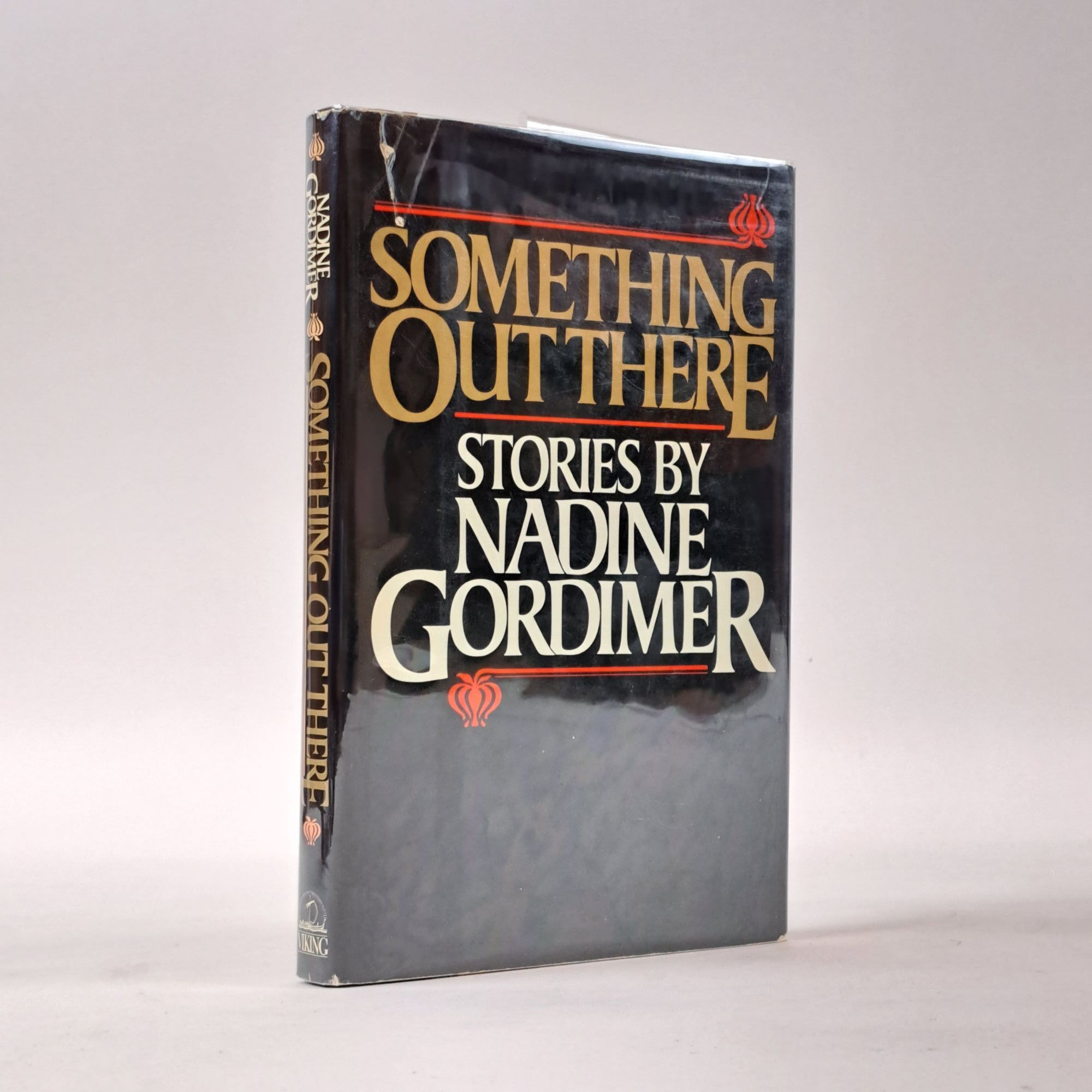 1397498 SOMETHING OUT THERE [Inscribed]. Nadine Gordimer.