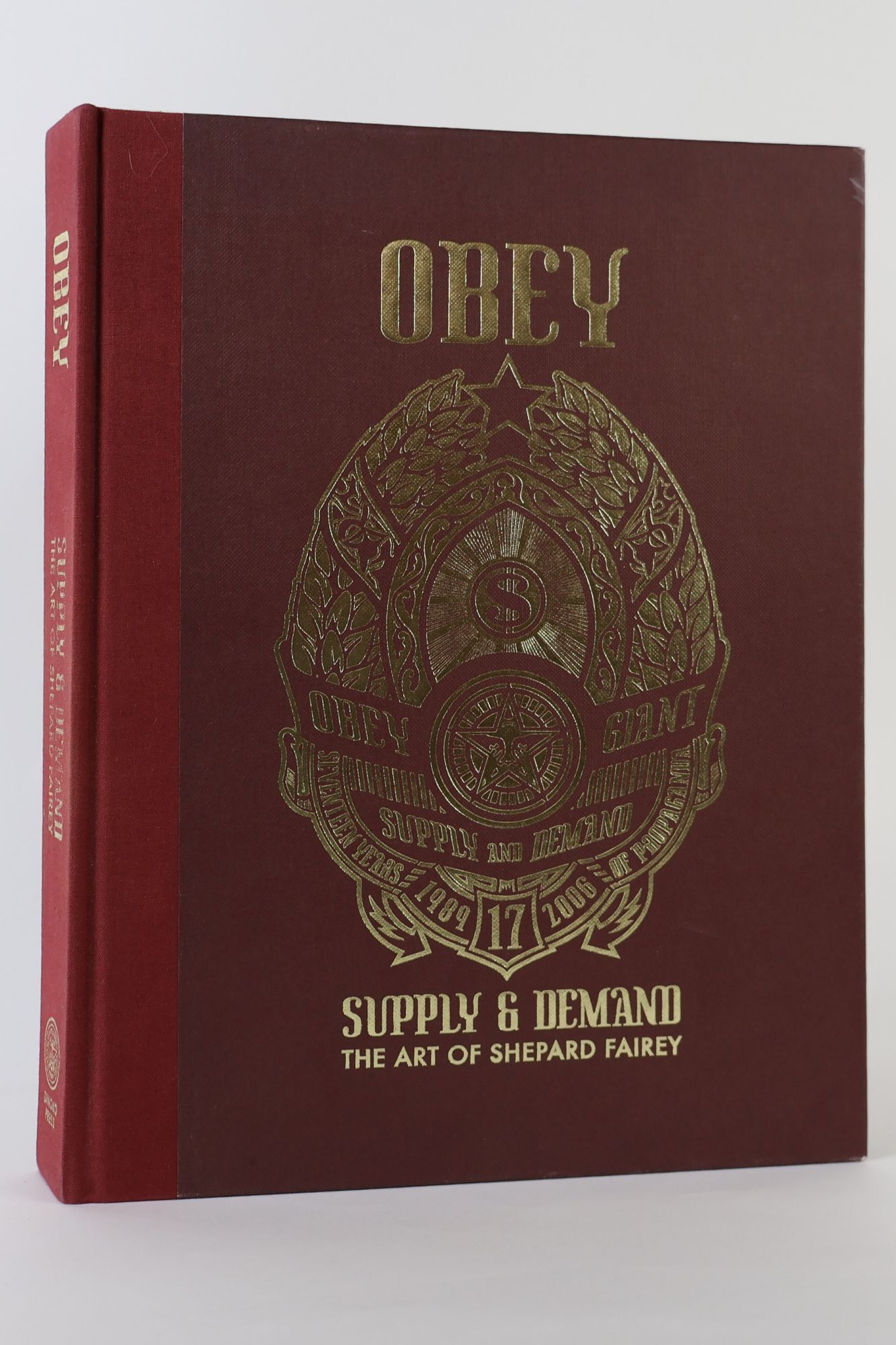 1398887 OBEY: SUPPLY & DEMAND [Inscribed]. Shepard Fairey.