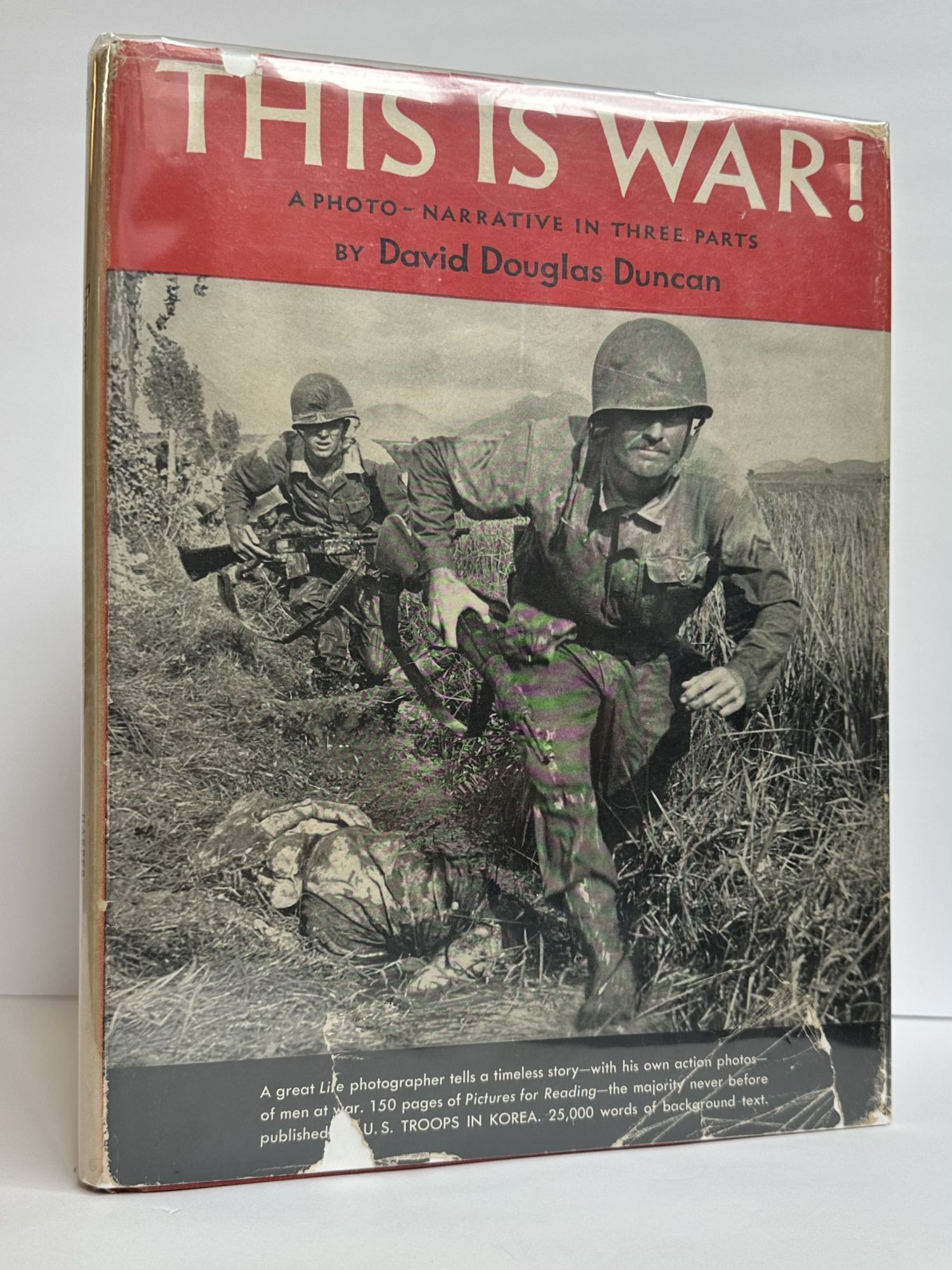 THIS IS WAR! A PHOTO-NARRATIVE IN THREE PARTS Inscribed | David