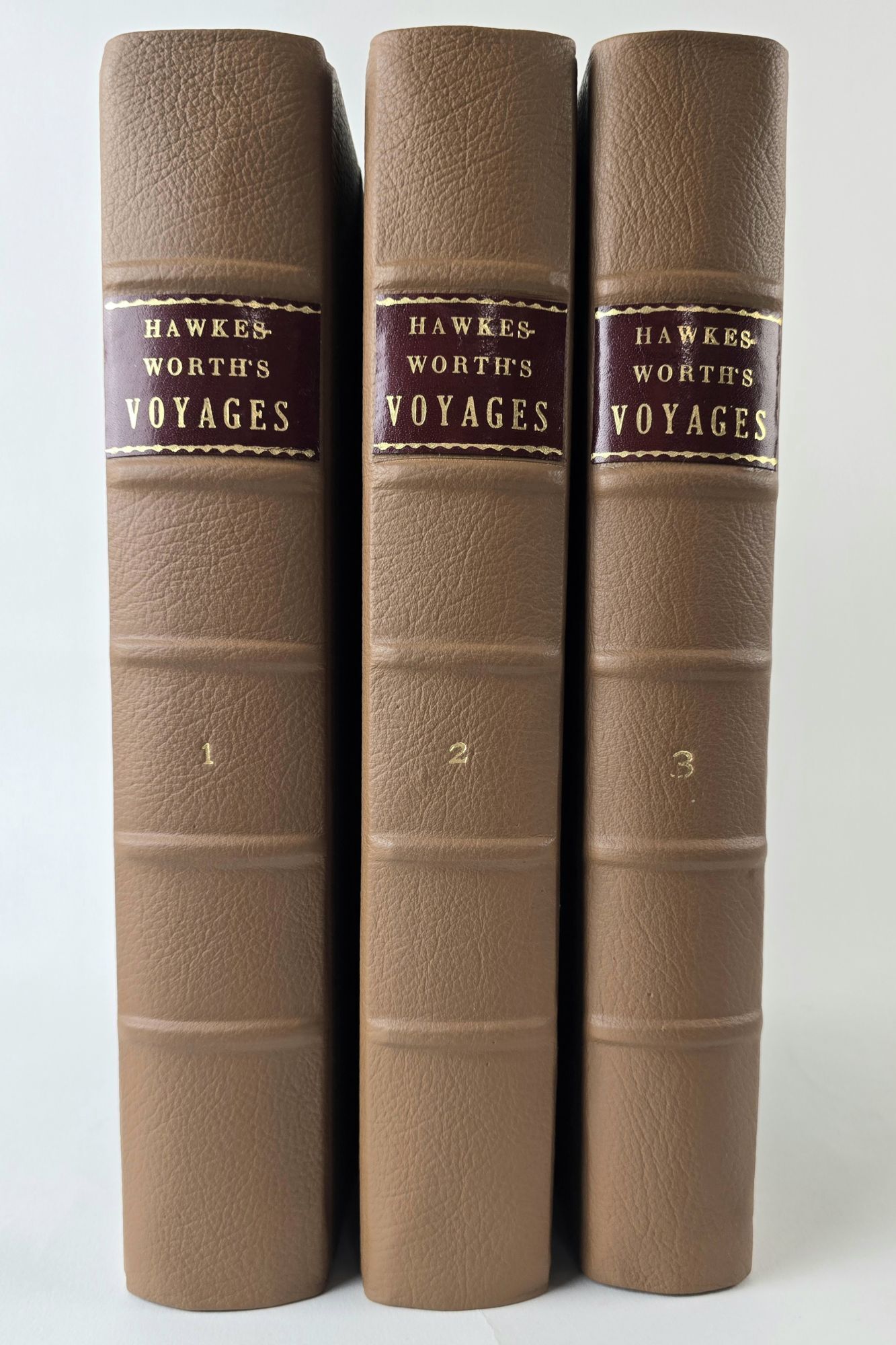 1402922 AN ACCOUNT OF THE VOYAGES UNDERTAKEN BY THE ORDER OF HIS PRESENT MAJESTY FOR MAKING DISCOVERIES IN THE SOUTHERN HEMISPHERE, AND SUCCESSIVELY PERFORMED BY COMMODORE BYRON, CAPTAIN WALLIS, CAPTAIN CARTERET, AND CAPTAIN COOK, IN THE DOLPHIN, THE SWALLOW, AND THE ENDEAVOUR [Three Volumes]. John Hawkesworth.
