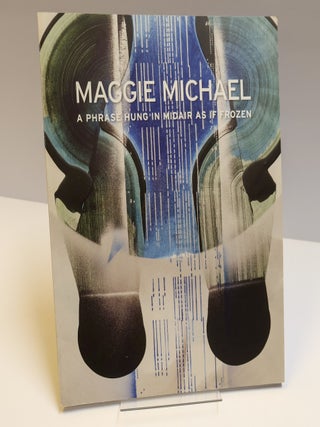 1409354 A PHRASE HUNG IN MIDAIR AS IF FROZEN. Maggie Michael