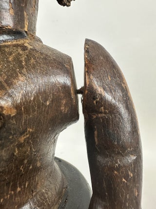 NIGERIAN PAINTED WOOD FEMALE FIGURE WITH MOVABLE ARMS