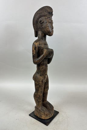 BAULE WOODEN MALE FIGURE HOLDING A BOWL, IVORY COAST