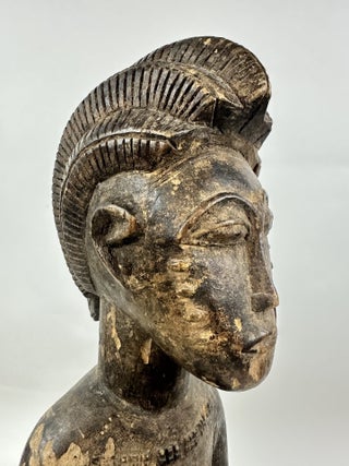 BAULE WOODEN MALE FIGURE HOLDING A BOWL, IVORY COAST