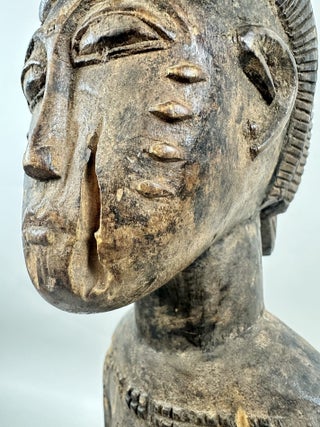 BAULE WOODEN MALE FIGURE HOLDING A BOWL, IVORY COAST