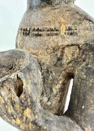 BAULE WOODEN MALE FIGURE HOLDING A BOWL, IVORY COAST