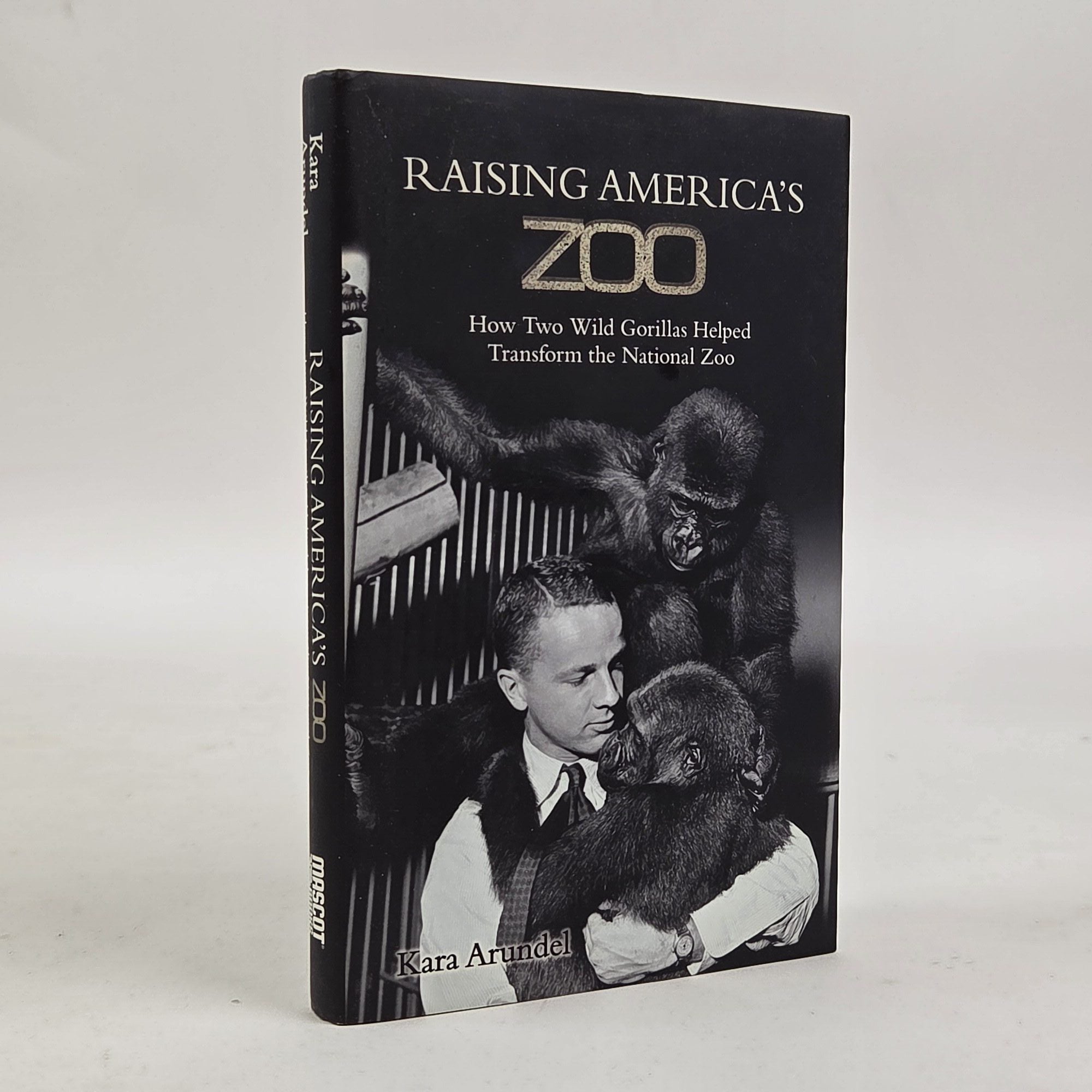 1413732 RAISING AMERICA'S ZOO: HOW TWO WILD GORILLAS HELPED TRANSFORM THE NATIONAL ZOO [Signed]. Kara Arundel.