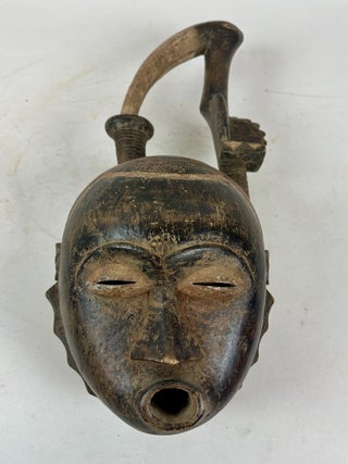 1413809 SENUFO WOODEN HELMET MASK WITH BIRD-BEAK, IVORY COAST