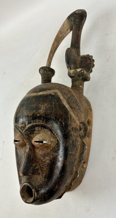 SENUFO WOODEN HELMET MASK WITH BIRD-BEAK, IVORY COAST
