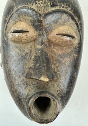 SENUFO WOODEN HELMET MASK WITH BIRD-BEAK, IVORY COAST