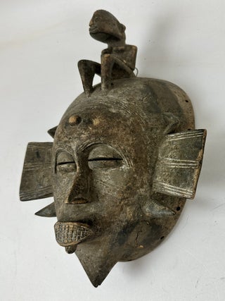 SENUFO KPELIE-TYPE WOODEN MASK, IVORY COAST