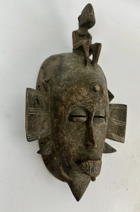 SENUFO KPELIE-TYPE WOODEN MASK, IVORY COAST