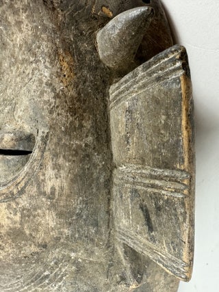 SENUFO KPELIE-TYPE WOODEN MASK, IVORY COAST