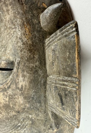 SENUFO KPELIE-TYPE WOODEN MASK, IVORY COAST
