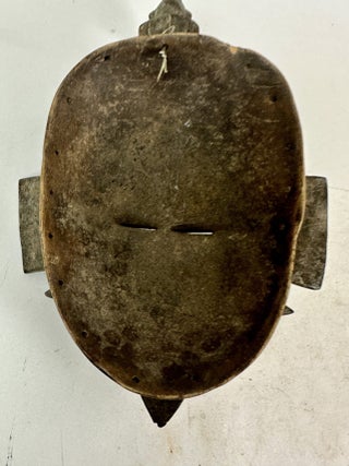 SENUFO KPELIE-TYPE WOODEN MASK, IVORY COAST