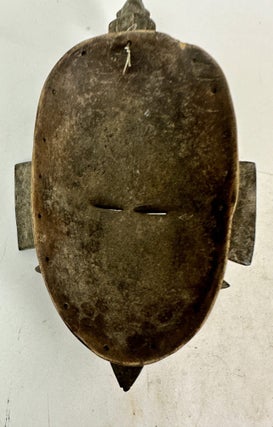 SENUFO KPELIE-TYPE WOODEN MASK, IVORY COAST