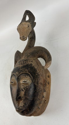 YAURE WOODEN HUMAN AND ANTELOPE MASK, IVORY COAST