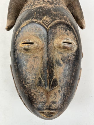 YAURE WOODEN HUMAN AND ANTELOPE MASK, IVORY COAST