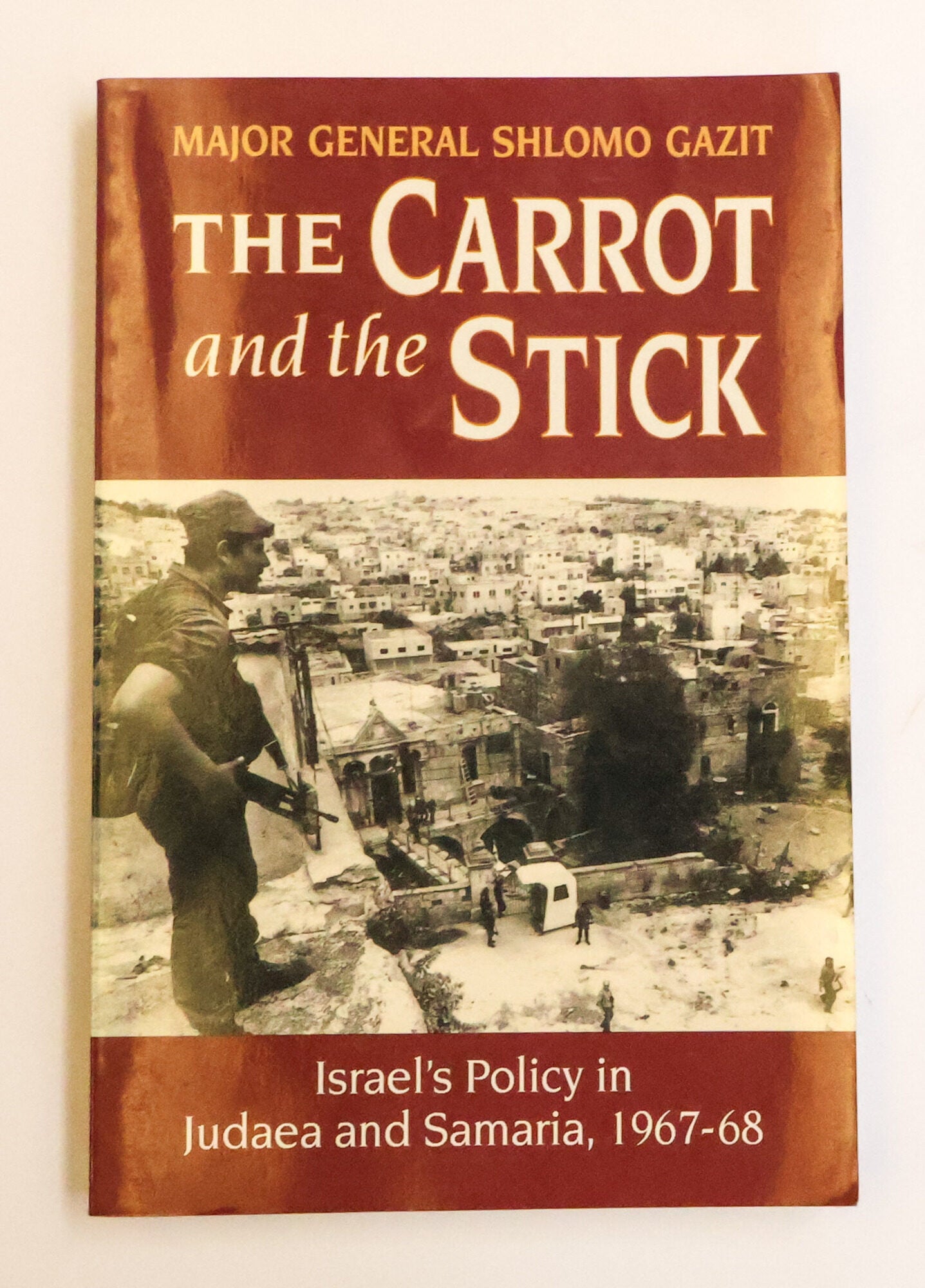 1414198 THE CARROT AND THE STICK: ISRAEL'S POLICY IN JUDAEA AND SAMARIA 1967-68 [Signed]. Major General Gazit Shlomo.