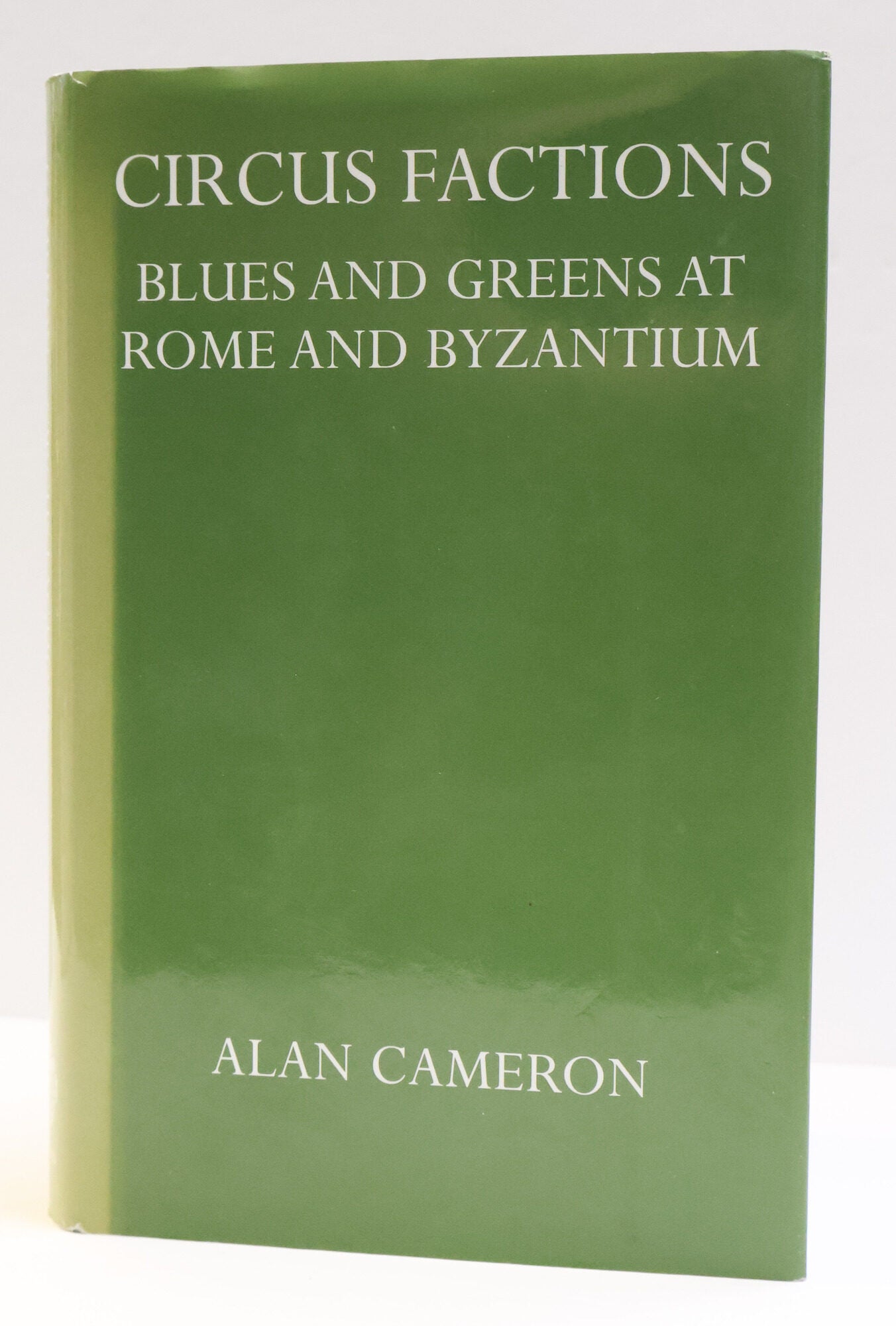 1416205 CIRCUS FACTIONS: BLUES AND GREENS AT ROME AND BYZANTIUM. Alan Cameron.