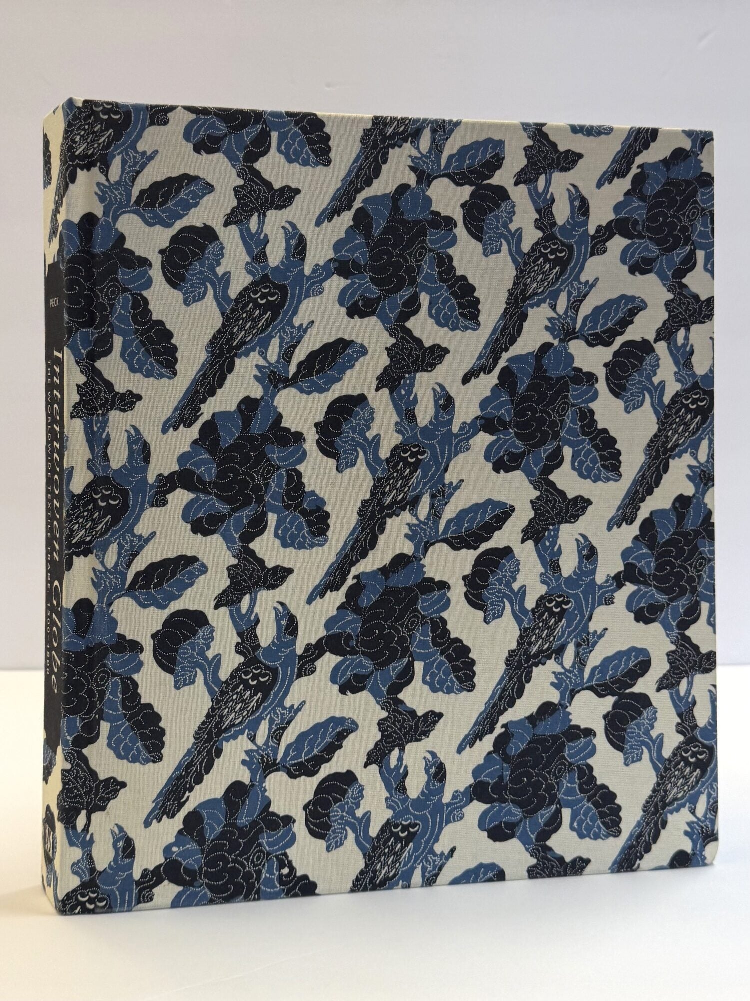 1416446 INTERWOVEN GLOBE: THE WORLDWIDE TEXTILE TRADE, 1500-1800. Amelia Peck.