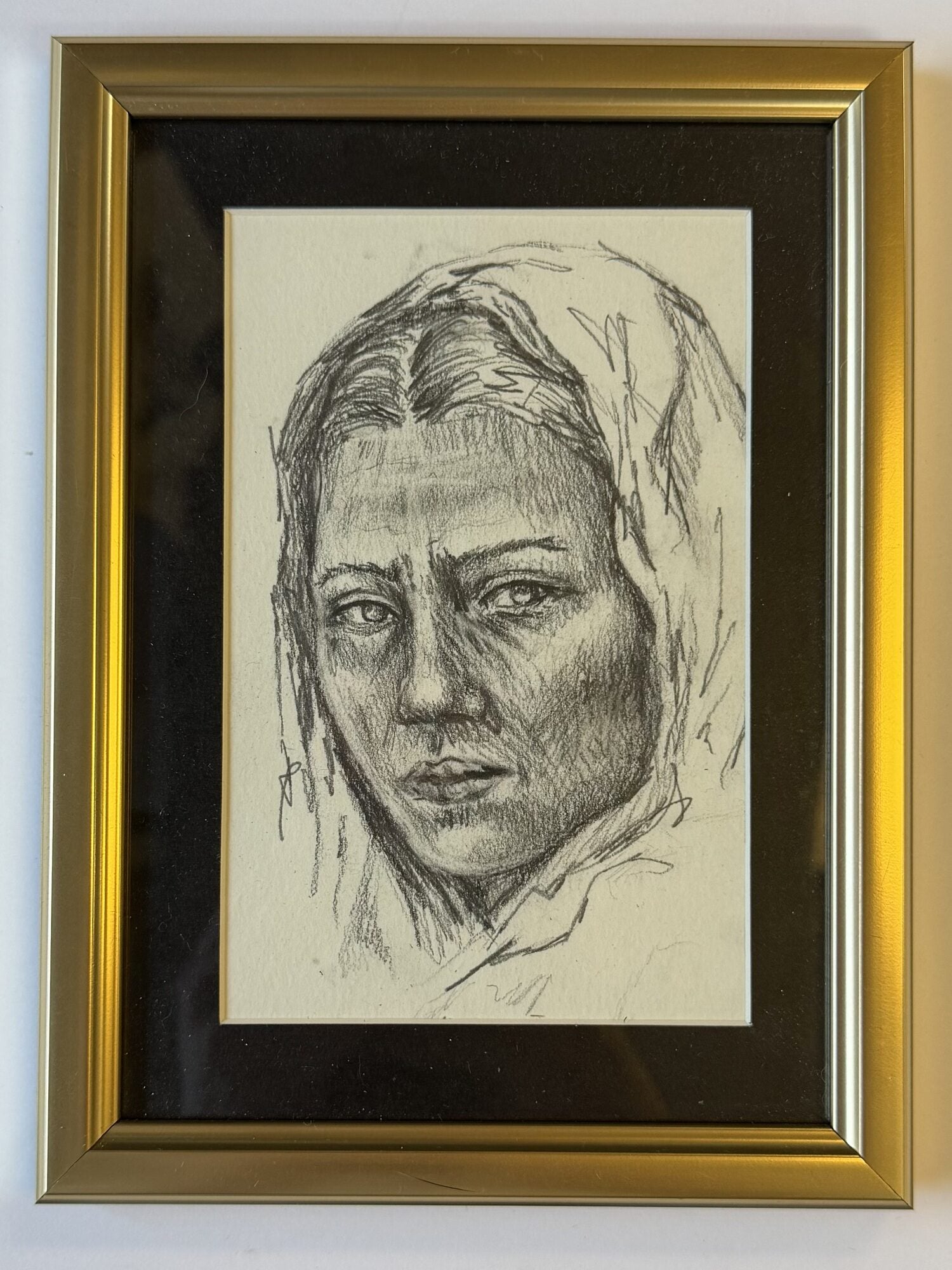 1417147 WOMAN IN HEADSCARF. Sarah Frickle.