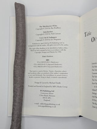 THE MACHINERIES OF JOY [Signed]