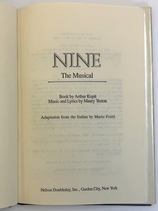 NINE [Inscribed]