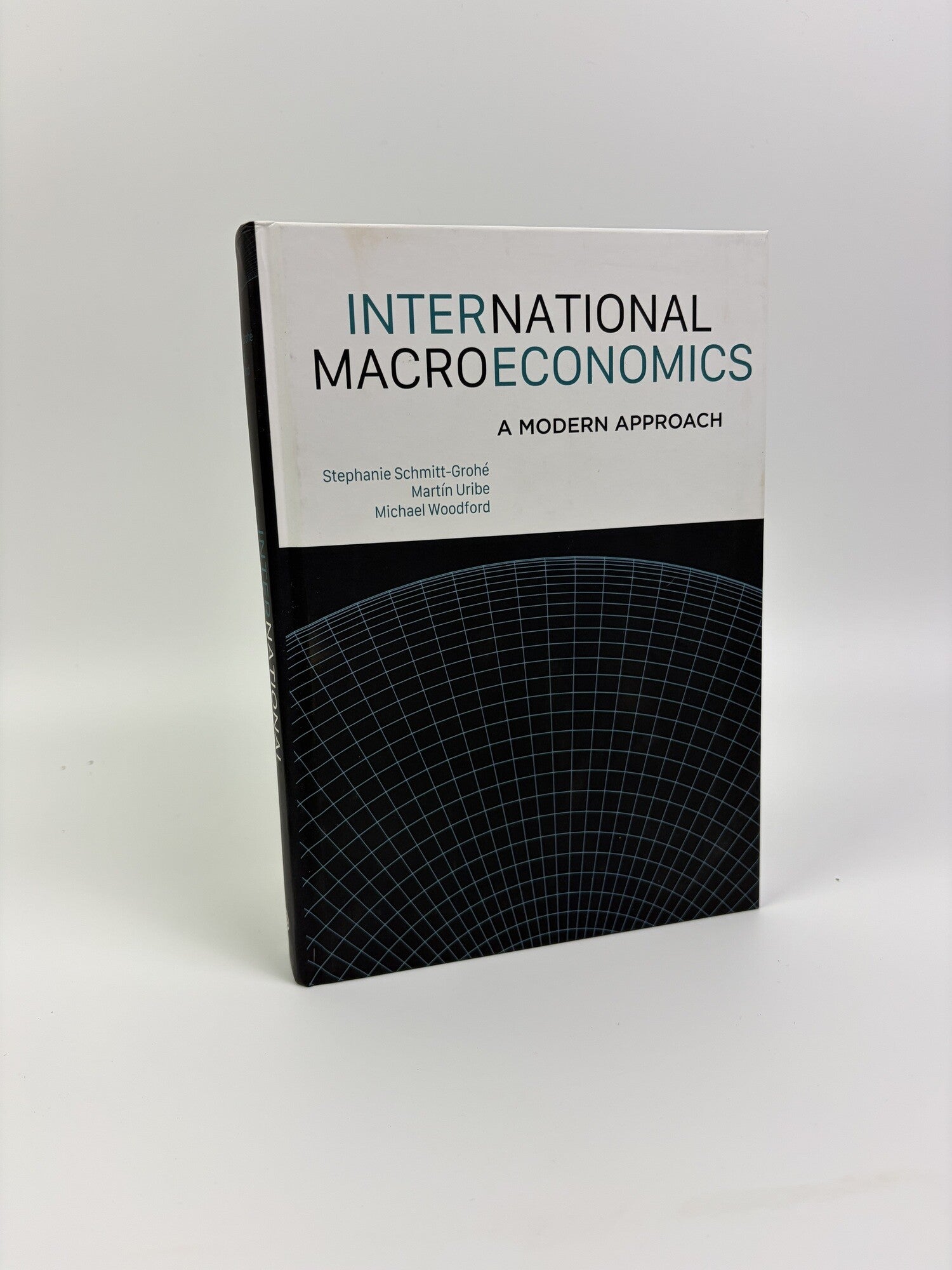 1419478 INTERNATIONAL MACROECONOMICS: A MODERN APPROACH. Stephanie Schmitt-Groh&eacute;, Mart&iacute;n Uribe, Michael Woodford.